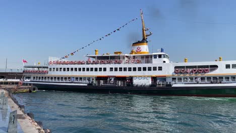 Ferry-boat-sailing-off-at-Bosphorus-Strait,-Istanbul,-Turkey