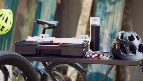 Bicycle-toolbox-placed-on-table-in-yard