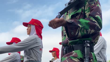 Rows-of-Indonesian-soldiers-and-students-,-training-to-prepare-for-Indonesia's-independence-celebrations