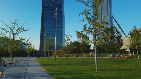 Milanese-people-go-about-their-business-in-the-shadow-of-skyscrapers