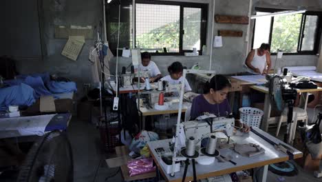 Clothing-Factory-Women-Sewing-Machine-Third-World-Asian-Girls-Slavery-Forced-Labor-Poverty-Trade-Hand-Crafted-Establishment-Nike