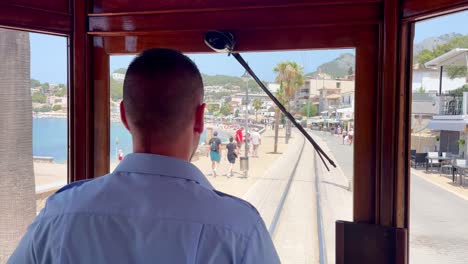 Train-Driver-on-Mallorca-Island-with-Beautiful-View-to-Port-de-Soller