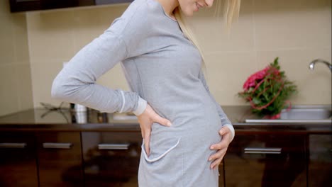 Pregnant-Mom-Posing-at-the-Kitchen