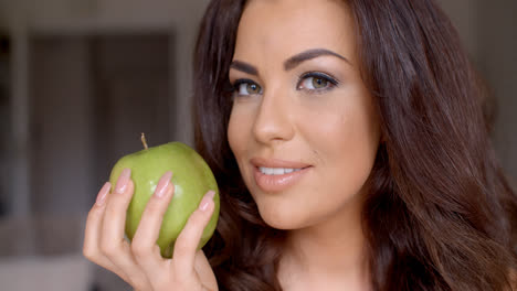 Smiling-Pretty-Woman-Holding-Fresh-Green-Apple