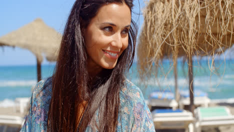 Smiling-Lady-at-the-Beach-Looking-Into-Distance