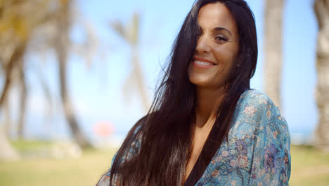 Happy-Pretty-Long-Haired-Woman-at-the-Beach