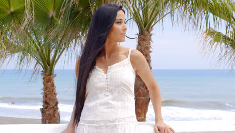 Woman-Looking-into-the-Distance-on-Tropical-Beach