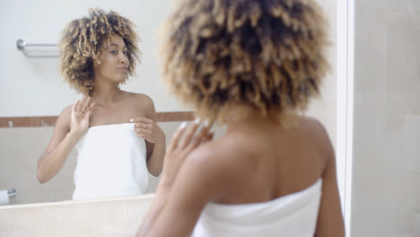 Woman-Arranging-Her-Exotic-Curly-Hair