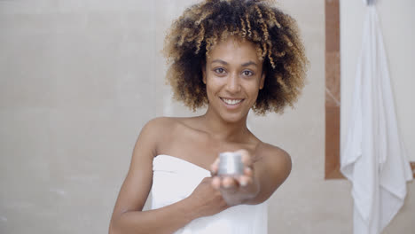 Cosmetic-Cream-Container-In-Woman-Hand