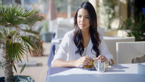 Woman-Waiting-For-Friend-In-Cafe