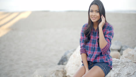 Elegant-Woman-Posing-On-The-Beach