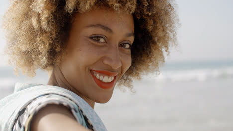 Woman-Smiling-At-Camera