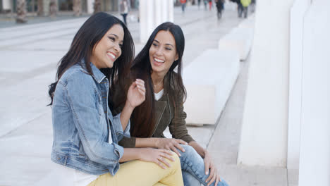 Two-trendy-young-women-relaxing