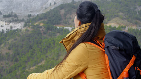 Female-backpacker-taking-a-rest