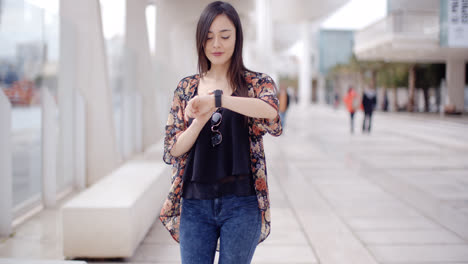 Young-woman-checking-her-wristwatch