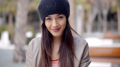 Pretty-thoughtful-young-woman-in-a-woolly-cap