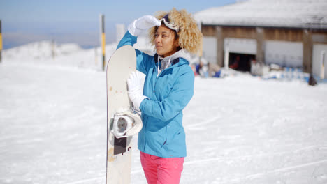 Attractive-young-woman-posing-at-a-ski-resort