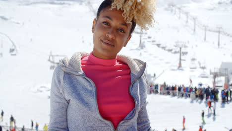 Trendy-young-woman-at-an-alpine-ski-resort