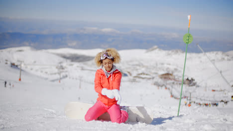 Snowboarder-Poniéndose-Los-Guantes