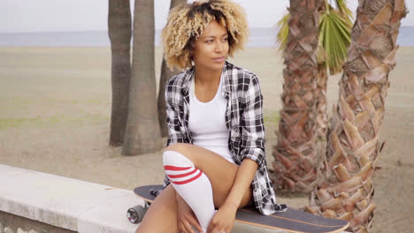 Sexy-beautiful-girl-with-longboard-on-the-beach