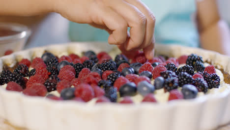 Hands-of-a-mother-and-little-daughter-baking