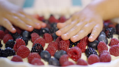 Hands-of-a-mother-and-little-daughter-baking