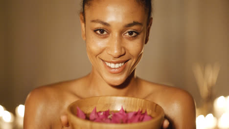 Woman-Holding-Spa-Treatment-Bowl