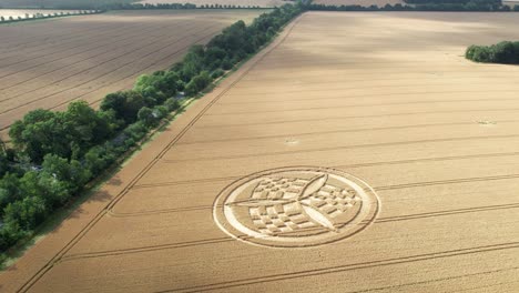 South-Wonston-2023-crop-circle-hoax-aerial-view-cloud-shadows-passing-over-sunlit-golden-Hampshire-farmland