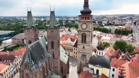 Stunning-aerial-reveal-of-historic-White-Tower-and-towers-of-gothic-Holy-Spirit-cathedral-in-Hradec-Kralove