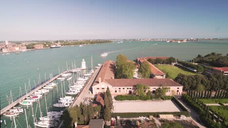 Aerial-view-of-Venice-canals-islands-and-Lido-from-San-Giorgio-Maggiore-towerbell-on-a-sunny-day