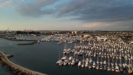 Rows-of-yachts-and-boats-at-Fremantle-sailing-club-in-Australia,-birdseye-view