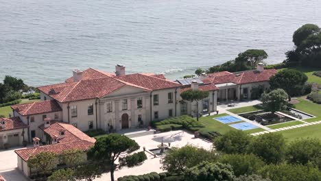 Aerial-View-Of-Pacific-Ocean-Front-Mansion-In-Malibu
