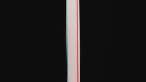 Plastic-straw-with-pink-and-blue-stripes-designed-for-drinks