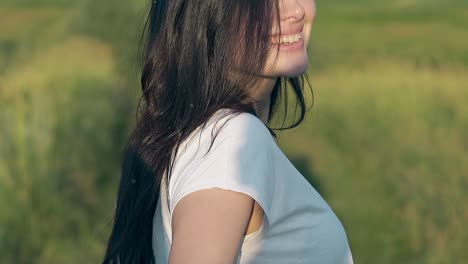 close-view-beautiful-long-haired-brunette-lady-turns-head