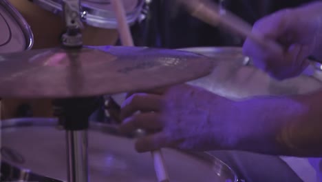 Drummer-plays-percussion-instruments-at-a-concert-as-part-of-a-musical-group