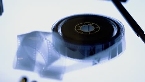 old-16mm-film-lies-on-the-illuminated-table