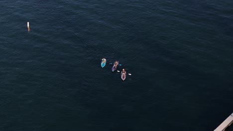 kayakers-on-lake-arrowhead-in-california-enjoying-a-sunny-day-AERIAL-ORBIT