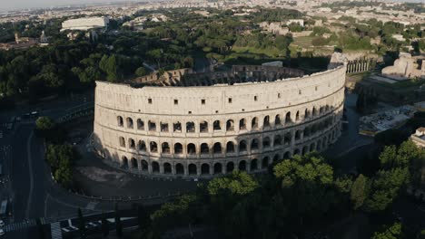 Drone-shot-of-the-Roman-Colosseum-basking-in-the-morning's-sunlight