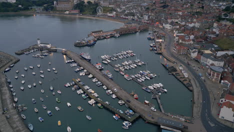 Pullback-Establishing-Drone-Shot-Over-Scarborough-Harbour-in-Low-Light