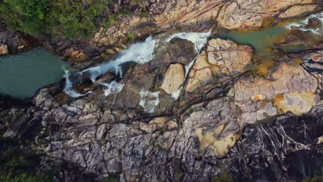 Aerial-over-Big-Rock-Falls-in-the-Mountain-Pine-Ridge-Forest-Reserve,-Belize
