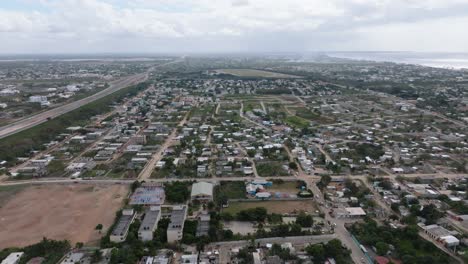 Drone-pan-view-of-Brisas-del-Este,-a-neighborhood-in-the-Dominican-Republic