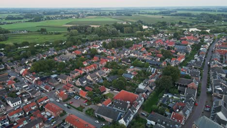Aerial-overview-of-a-small-town-at-sunset