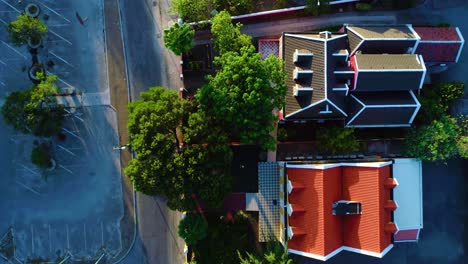 Top-down-drone-bird's-eye-view-of-bright-red-roofs-in-willemstad-curacao