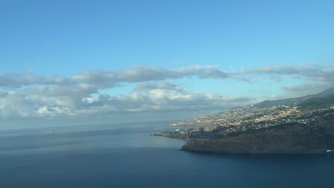 POV-shot-of-an-airplane-approaching-landing-at-Madeira-airport,-Portugal