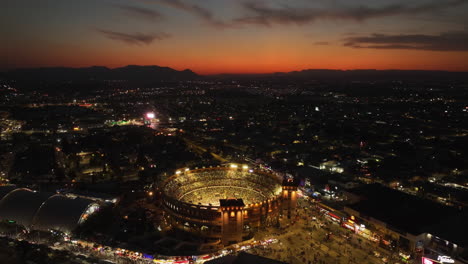 Plaza-De-Toros-Monumental-De-Aguascalientes,-Colorful-Evening-In-Mexico---Aerial-View