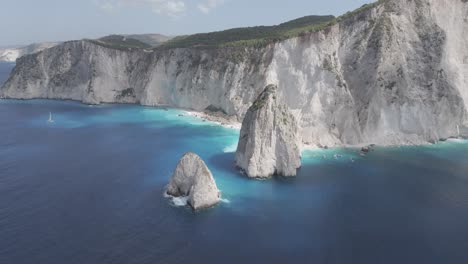 Drone-Shot-of-Zakynthos-Island-Coastline,-Myzithres-Rocks-and-Blue-Ionian-Sea-on-Summer-Day-50fps-D-logM