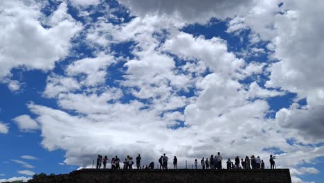 Slow-motion-silhouette-shot-of-tourists-exploring-the-Teotihuacan-Pyramids