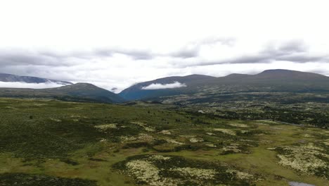Mountains-with-clouds-drone-footage-Norway-Dovrefjell