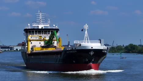 Sletringen-Vessel-cruising-through-blue-sea-in-the-early-morning---Cinematic-tracking-shot