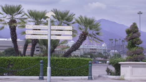 Santa-Anita-Park-Clubhouse-in-Arcadia,-California-showing-entrance-signs-stable-shot